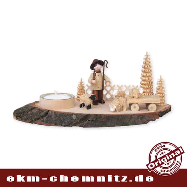 Baumscheibe Teelichthalter liegend - Schäfer mit Schafen Rustikaler Teelichthalter mit einem Teelicht auf einer Baumscheibe mit Rinde. Bestückt mit dem Hirte, eine Sammelfigur von Romy Thiel. Die Schafe sind original erzgebirgische Reifentiere.
