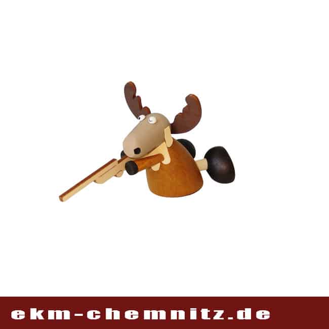 Drechselfigur - Elch mit Flinte Der Elch mit Flinte auf der Jagt nach weiteren großartigen Drechselfiguren zum Sammeln.