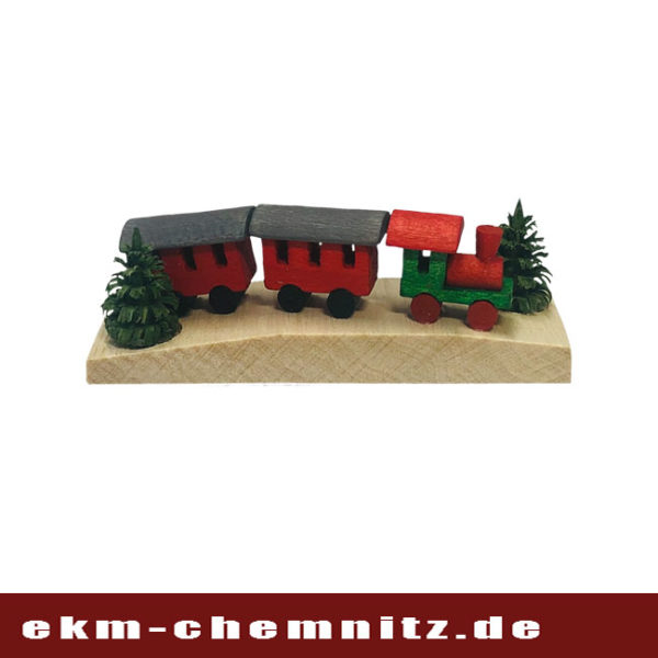 In der Kategorie Miniaturen finden Sie diese kleine Eisenbahn in Rot auf Brettchen.